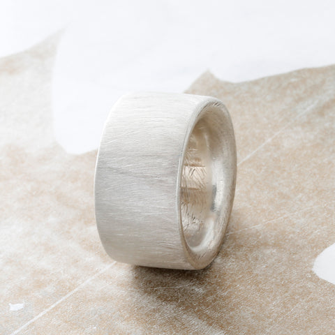 Side view of The Fortress sterling silver ring showing 13mm height and substantial band